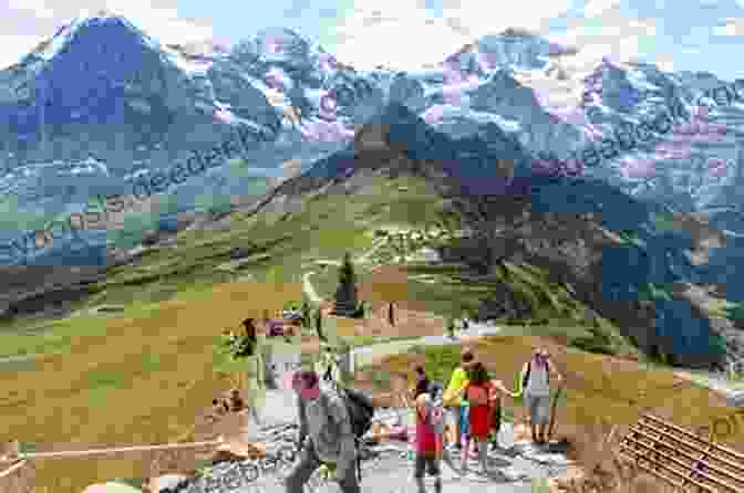 Hikers Enjoying The Panoramic Views From Kleine Scheidegg To Wengen Trail Walking In Switzerland S Berner Oberland: Easy Hikes In The Jungfrau Region